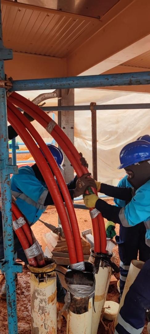 Transformer installation with rigging crew